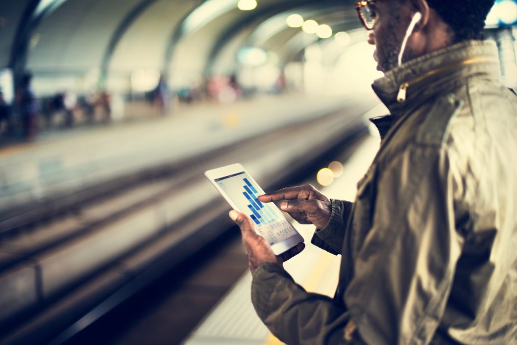 A user accessing a software application on a mobile device.